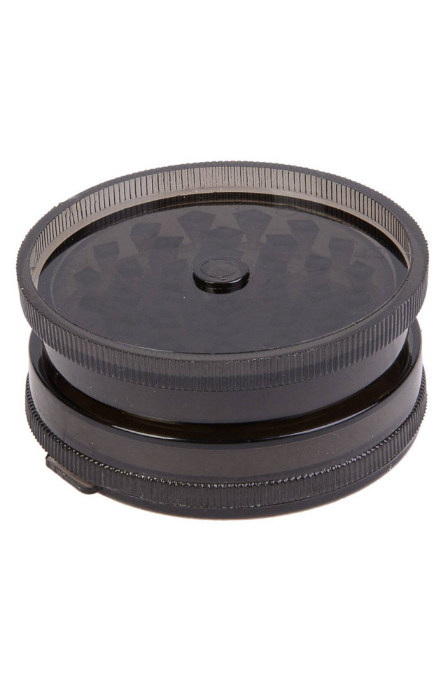 Grinder noir pour broyer les gousses de cannabidiol